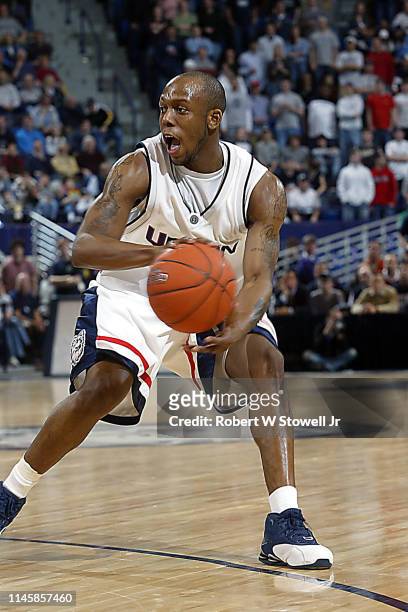 University of Connecticut point guard Taliek Brown looks to pass the basketball during a game against Georgetown, Storrs, Connecticut, August 2, 2004.