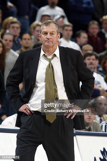 University of Connecticut head basketball coach Jim Calhoun surveys the action during a game against Georgetown, Storrs, Connecticut, June 30, 2002.