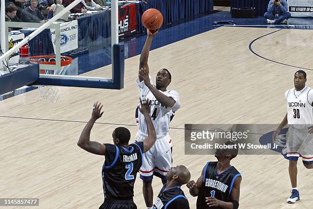 University of Connecticut basketball player Ben Gordon shoots a jump shot during a game against Georgetown University, Hartford, Connecticut, June...