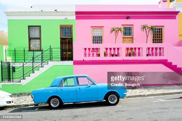 colorful bo-kaap neighborhood houses in cape town south africa - cape town bo kaap stock pictures, royalty-free photos & images