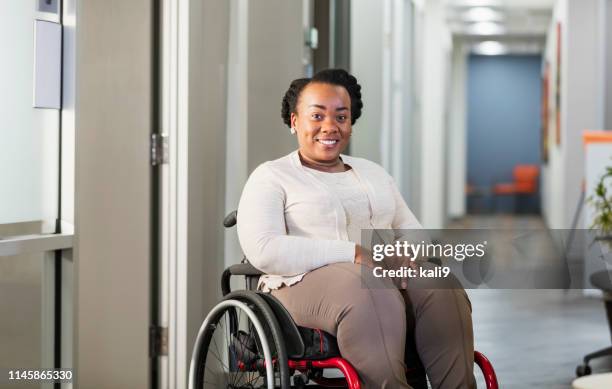 african-american businesswoman in wheelchair - of deformed people stock pictures, royalty-free photos & images