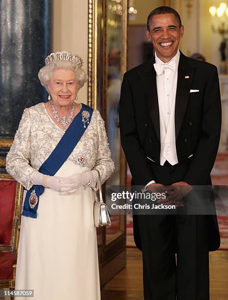 Queen Elizabeth II and U.S. President Barack Obama pose in the Music Room of Buckingham Palace ahead of a State Banquet on May 24, 2011 in London,...