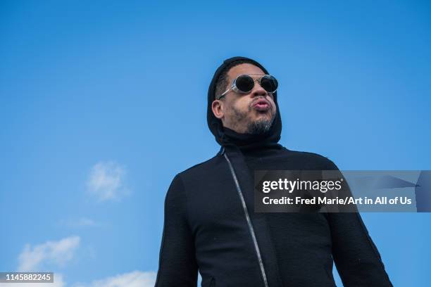 Joey starr preparing himself for a bungee jump session from a cliff, Occitanie, Florac, France on July 2, 2017 in Florac, France.