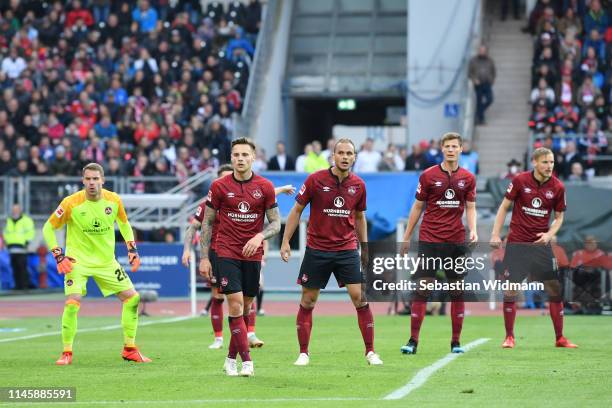 Goalkeeper Christian Mathenia of Nuernberg, Robert Bauer, Ewerton, Patrick Erras and Hanno Behrens of Nuernberg look on during the Bundesliga match...