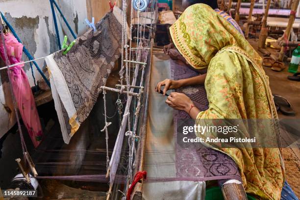 couple working at textile loom in dhaka, bangladesh - textile factory stock pictures, royalty-free photos & images