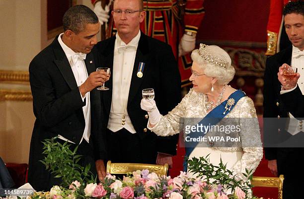 President Barack Obama and Queen Elizabeth II during a State Banquet in Buckingham Palace on May 24, 2011 in London, England. The 44th President of...