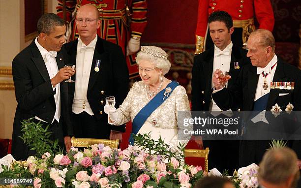 President Barack Obama, Queen Elizabeth II and Prince Philip, Duke of Edinburgh during a State Banquet in Buckingham Palace on May 24, 2011 in...