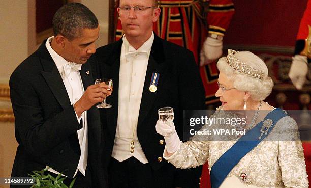 President Barack Obama and Queen Elizabeth II during a State Banquet in Buckingham Palace on May 24, 2011 in London, England. The 44th President of...