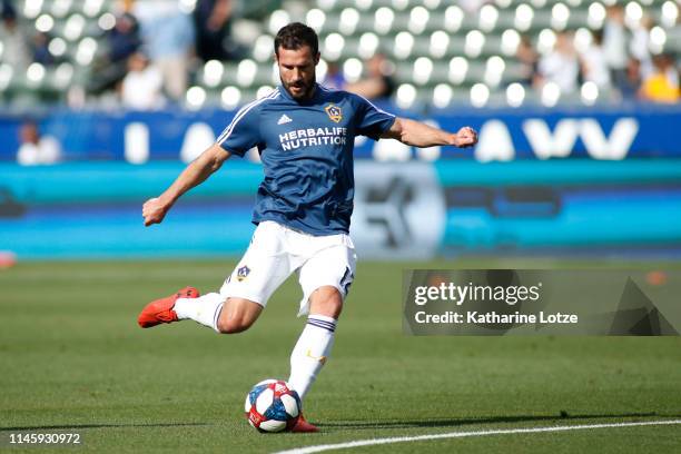 Chris Pontius of Los Angeles Galaxy takes a shot on goal during a warm up ahead of a game against Real Salt Lake at Dignity Health Sports Park on...