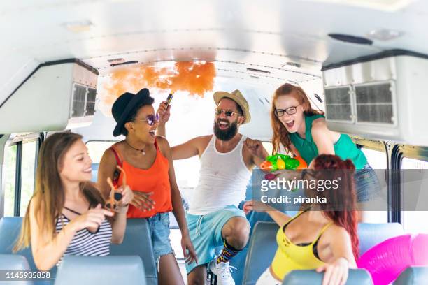 young adults celebrating - party bus stock pictures, royalty-free photos & images