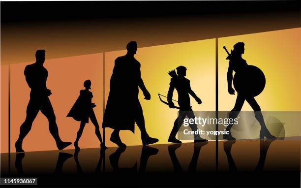 vector walking superheroes team silhouette - walking corridor stock illustrations