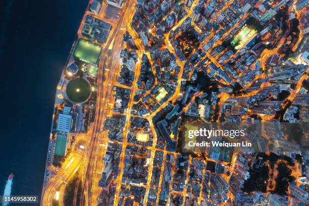 hong kong victoria harbour night view - aerial hong kong stock-fotos und bilder