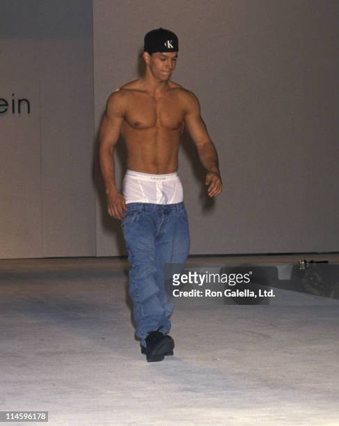 Singer Mark Wahlberg walks the runway at the Seventh Annual California Fashion Industry Friends of AIDS Project Los Angeles Benefit Dinner and...