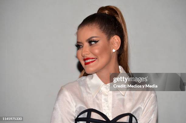 Vanessa Claudio smiles during a press conference to present the host of the reality show 'La Más Draga 2' at Universidad de la Comunicación on April...