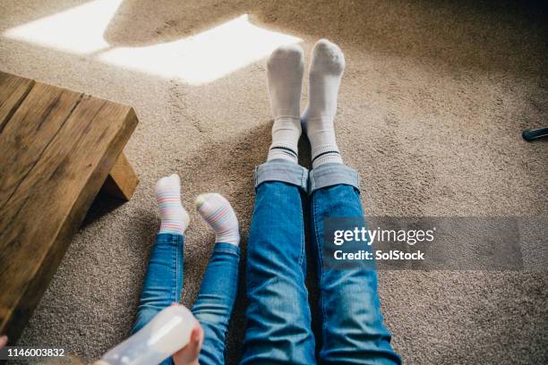 relaxing at home - kids white socks stock pictures, royalty-free photos & images
