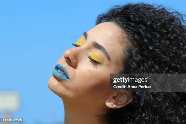 natural beauty against the wind part 3 - yellow eyeshadow stock pictures, royalty-free photos & images