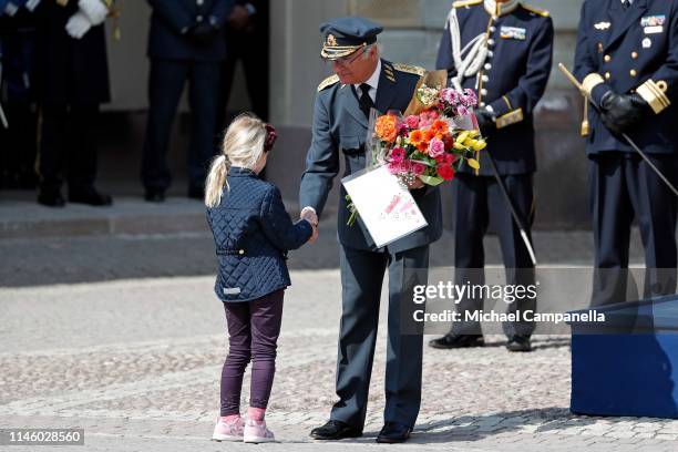 King Carl XVI Gustaf of Sweden receives flowers at a celebration of his 73rd birthday anniversary at the Royal Palace on April 30, 2019 in Stockholm,...