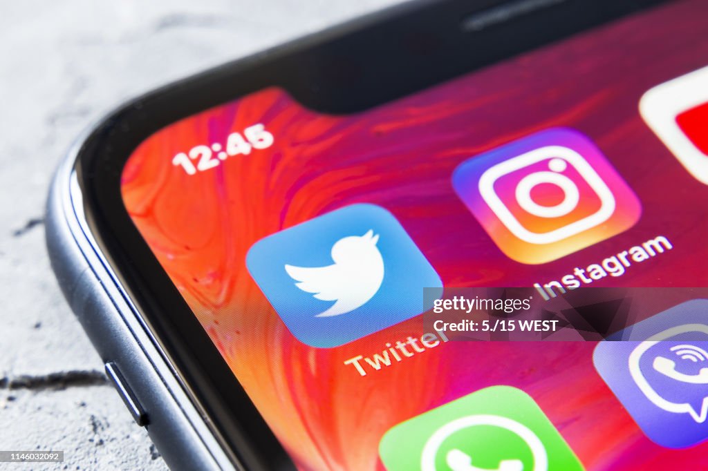 Twitter and instagram apps in iphone xr, close up