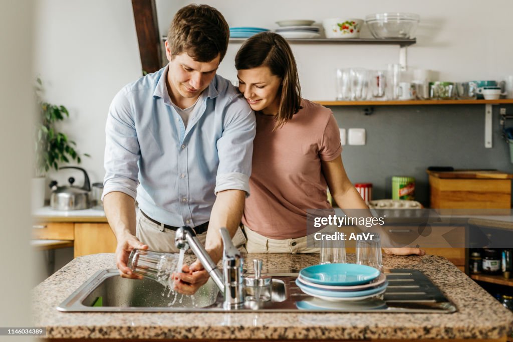 Husband washing the dishes