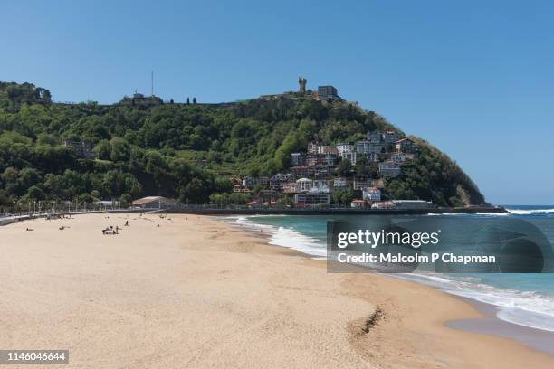 ondarreta beach and mount igeldo, san sebastian, basque country, spain - spain san sebastian imagens e fotografias de stock