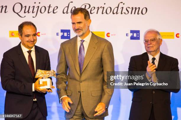 King Felipe delivers his prize to Diego Cabot during the event of delivery of the XXXVI Edition of the International Journalism Awards "King of...