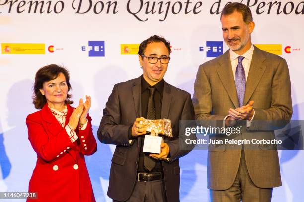 King Felipe delivers his prize to Roberto Navia Gabriel during the event of delivery of the XXXVI Edition of the International Journalism Awards...