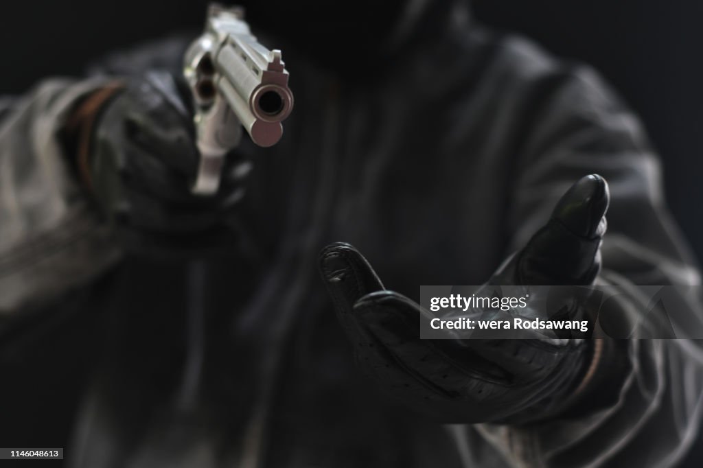 Armed robbers used the gun to robbery the money
