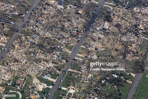 Damage is seen one day after a tornado tore through Joplin killing at least 122 people on May 24, 2011 in Joplin, Missouri. The tornado that ripped...