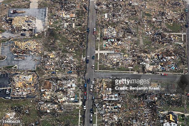 Damage is seen one day after a tornado tore through Joplin killing at least 122 people on May 24, 2011 in Joplin, Missouri. The tornado that ripped...