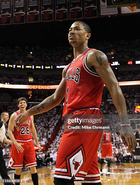 Derrick Rose of the Chicago Bulls reacts after he dunked on Joel Anthony of the Miami Heat in the first half of Game Four of the Eastern Conference...