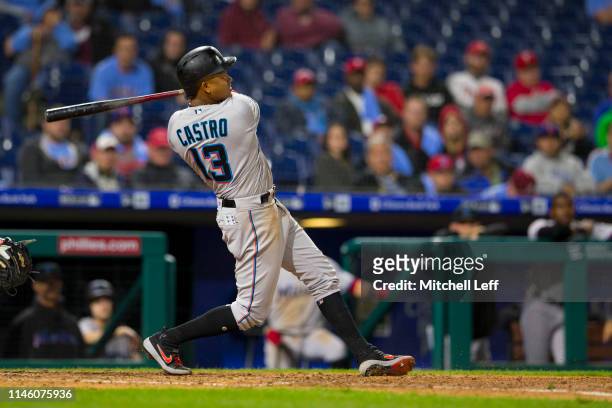 Starlin Castro of the Miami Marlins hits a two run home run in the top of the tenth inning against the Philadelphia Phillies at Citizens Bank Park on...