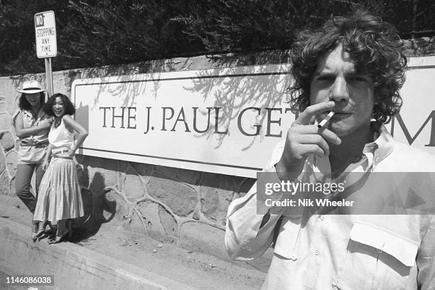 Santa Monica John Paul Getty III, grandson of billionaire Paul Getty, stands with two friends in front of entrance to the Getty Villa Museum in Santa...