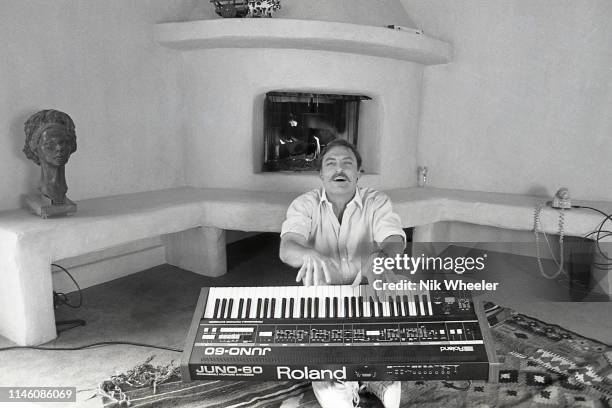 American actor and star of TV series Mike Hammer, Stacy Keach, plays keyboard in living room of home he shares with with third wife Jill Donohue in...