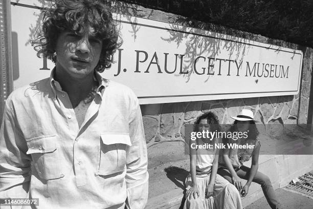 Santa Monica John Paul Getty III, grandson of billionaire Paul Getty, stands with two friends in front of entrance to the Getty Villa Museum in Santa...