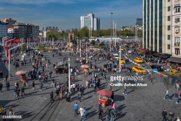 view of the taksim square in beyoglu district of istanbul, turkey - taksim square stock pictures, royalty-free photos & images