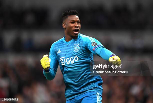 Andre Onana of Ajax celebrates as Donny van de Beek scores his team's first goal during the UEFA Champions League Semi Final first leg match between...