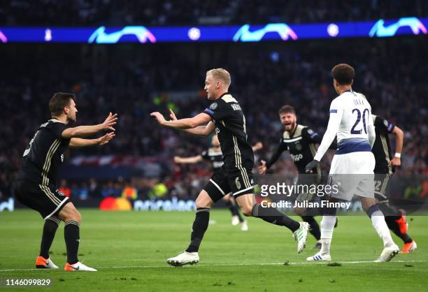 Donny van de Beek of Ajax celebrates as he scores his team's first goal with Joel Veltman during the UEFA Champions League Semi Final first leg match...