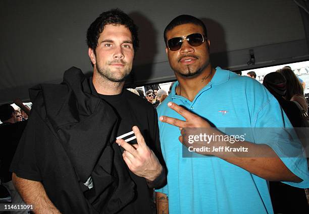 Shawne Merriman and Matt Leinart during The 5th Annual Cadillac Super Bowl Grand Prix at American Airlines Arena in Miami Beach, Florida, United...