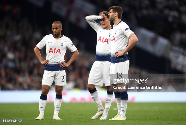 Lucas Moura, Dele Alli and Fernando Llorente of Tottenham Hotspur look despondent during the UEFA Champions League Semi Final first leg match between...