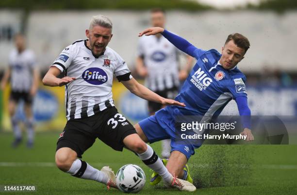 Louth , Ireland - 24 May 2019; Darragh Markey of St Patricks Athletic in action against Dean Jarvis of Dundalk during the SSE Airtricity League...