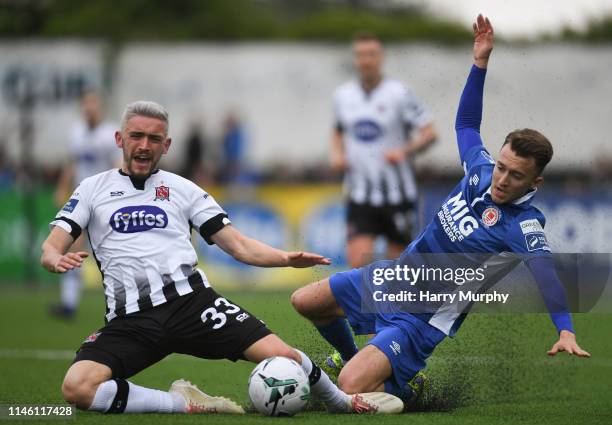 Louth , Ireland - 24 May 2019; Darragh Markey of St Patricks Athletic in action against Dean Jarvis of Dundalk during the SSE Airtricity League...