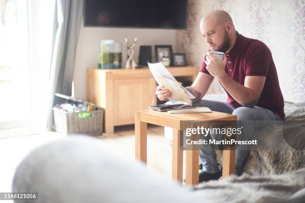 reading the latest letter - statement stock pictures, royalty-free photos & images