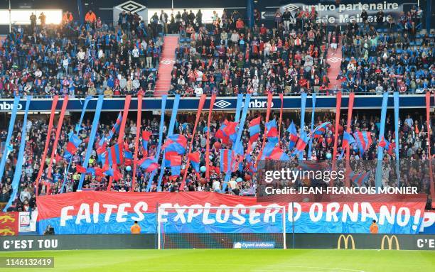 Caen's supporters cheer for their team prior to the French L1 football match between Stade Malherbe Caen and FC Girondins de Bordeaux at the Michel...