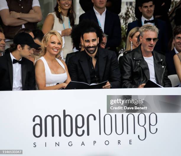 Brandon Thomas Lee, Pamela Anderson, Adil Rami and Eddie Irvine attend Amber Lounge U*NITE Fashion Monaco 2019 at Le Meridien Beach Plaza Hotel on...