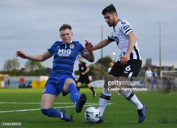 Louth , Ireland - 24 May 2019; Jordan Flores of Dundalk in action against Ciaran Kelly of St Patricks Athletic during the SSE Airtricity League...