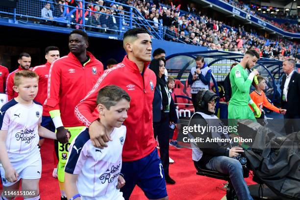 Brice Samba and Faycal Fajr of Caen during the Ligue 1 match between Stade Malherbe Caen and FC Girondins de Bordeaux on May 24, 2019 in Caen, France.