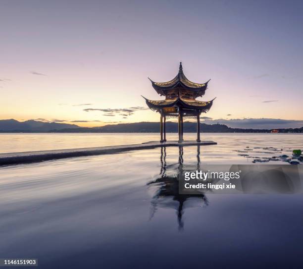 hangzhou west lake jixian pavilion sunset scenery - west lake hangzhou stock pictures, royalty-free photos & images