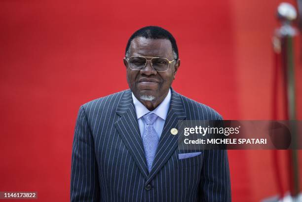 Namibian President Hage Geingob reacts while arriving at the Loftus Versfeld Stadium in Pretoria, South Africa, for the inauguration of Incumbent...