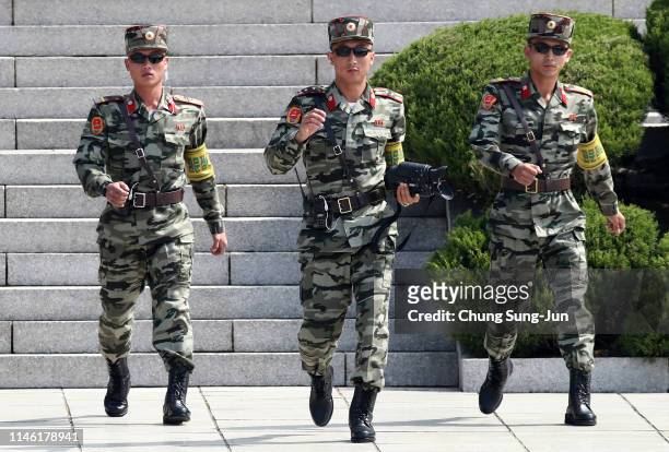 North Korean soldiers patrol at the truce village of Panmunjom inside the demilitarized zone separating the South and North Korea on May 01, 2019 in...