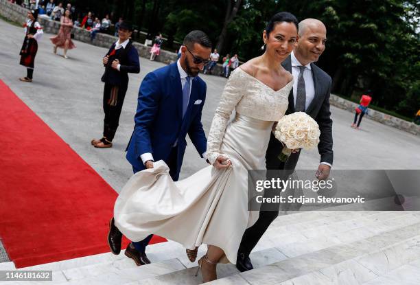 Bride of Prince Dushan, Valerie De Muzio arrives at the wedding ceremony at Oplenac church on May 25, 2019 in Topola, Serbia. Prince Dushan...